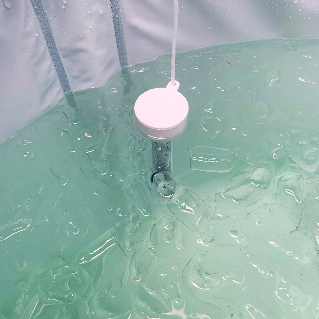Floating temperature sensor in ice-filled recovery tub.