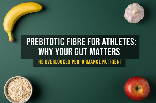 Overhead flat-lay of banana, garlic, oats, and apple on a dark green background with the text 'Prebiotic Fibre for Athletes: Why Your Gut Matters